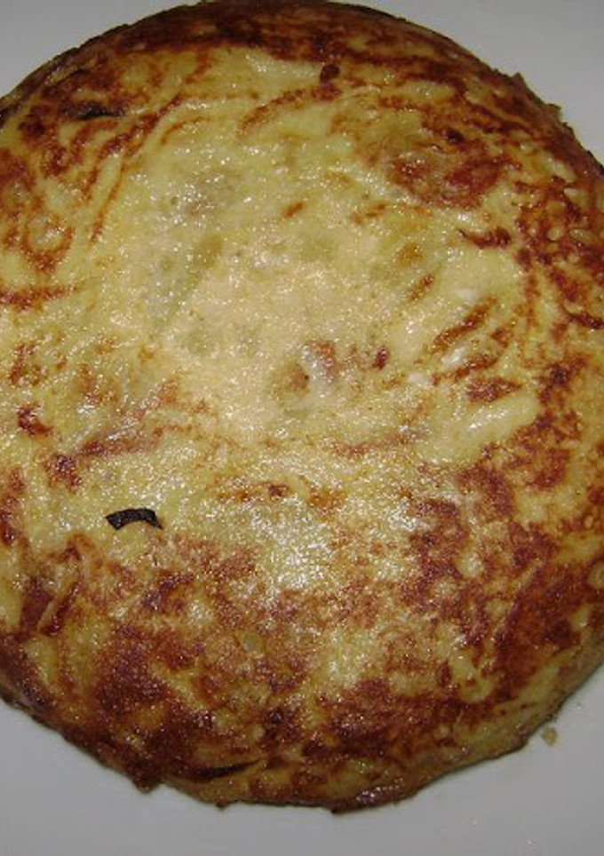 Una foto de Tortilla de Patatas con Cebolla