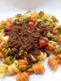 Trottole vegetales con espárragos trigueros y pesto rojo