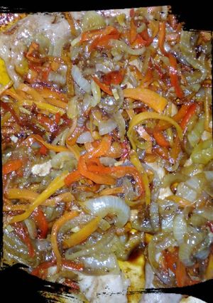 Una foto de Chuletas de cerdo en verduras