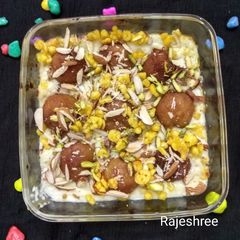 A picture of Baked Boondi Gulab Jamun Rabri.