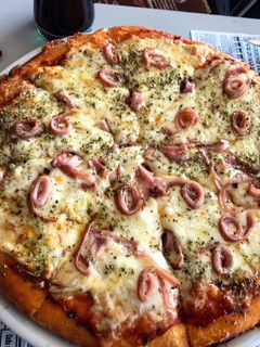 Una foto de Pizza al estilo argentino
