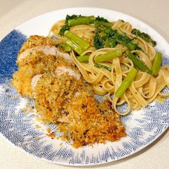A picture of Crunchy parmesan - crushed chicken with asparagus and lemon fettuccine.
