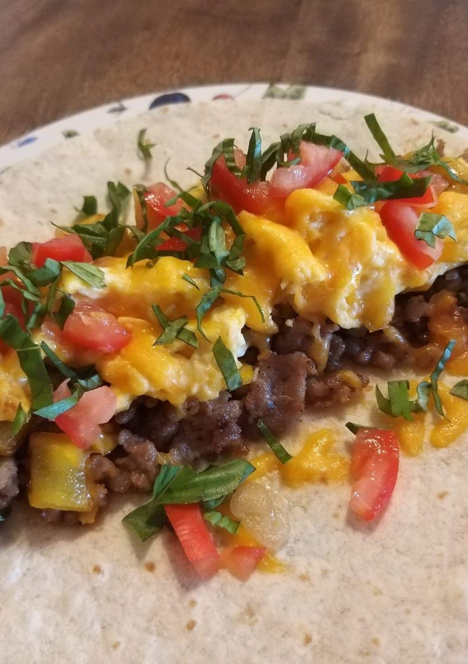 A picture of Breakfast wrap with Italian sausage.