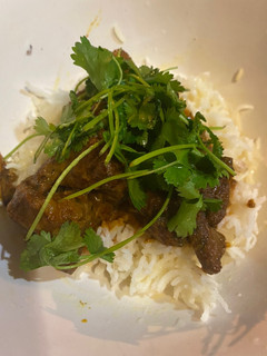 A picture of Lamb curry with red Thai curry paste.