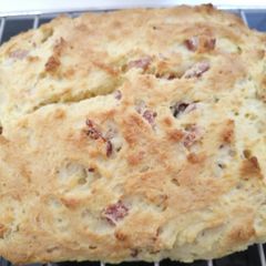 A picture of Rustic bread with ricotta and speck.