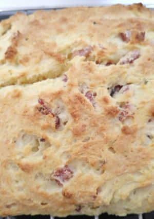 A picture of Rustic bread with ricotta and speck.