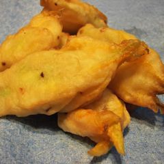 A picture of Zucchini flowers stuffed with feta.