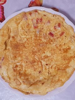 Una foto de Tortilla con pimiento y cebolla
