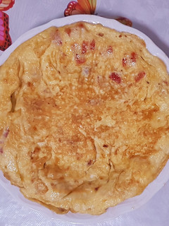 Una foto de Tortilla con pimiento y cebolla