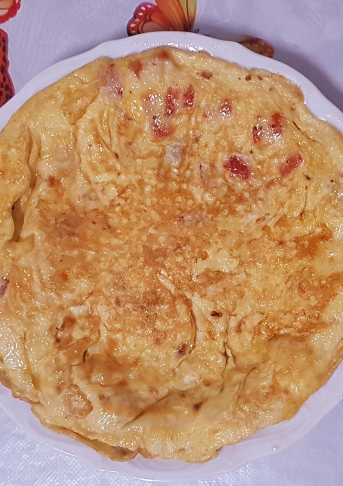 Una foto de Tortilla con pimiento y cebolla