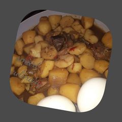 A picture of Irish Potatoes and meat.