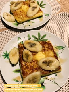 A picture of Banana toast with honey and butter.