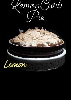 Una foto de Tarta de cuajada de limón y merengue flameado