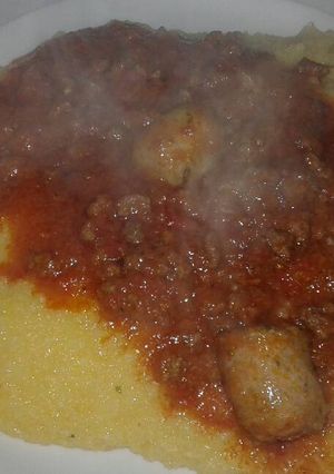 Una foto de Polenta con tuco