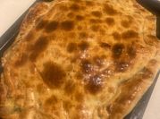 Una foto de pascualina jamón y queso