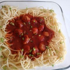 A picture of Meat balls in tomatoes sauce.