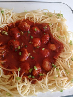 A picture of Meat balls in tomatoes sauce.