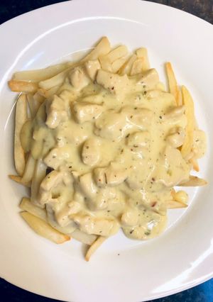Una foto de Pollo al ajillo con crema de mostaza 🍽
