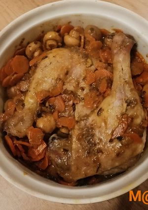 Une photo de Cuisses de canard aux pruneaux