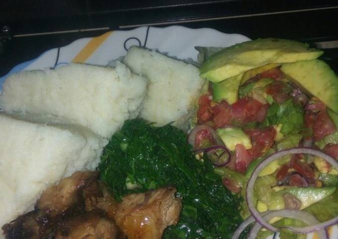 Goat roasted meat, greens and lettuce kachumbari