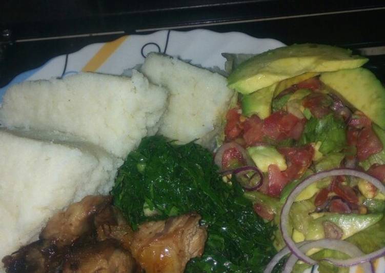 Goat roasted meat, greens and lettuce kachumbari