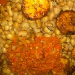 A picture of Bean with plaintain and fried stew.