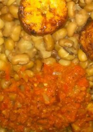 A picture of Bean with plaintain and fried stew.