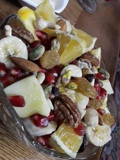 صورة لوصفة سلطه فواكه مع العسل والمكسرات