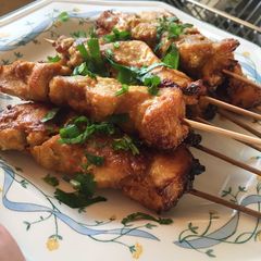 A picture of Chicken Satay in Spicy Peanut Butter and Coconut Sauce.