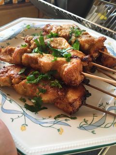 A picture of Chicken Satay in Spicy Peanut Butter and Coconut Sauce.