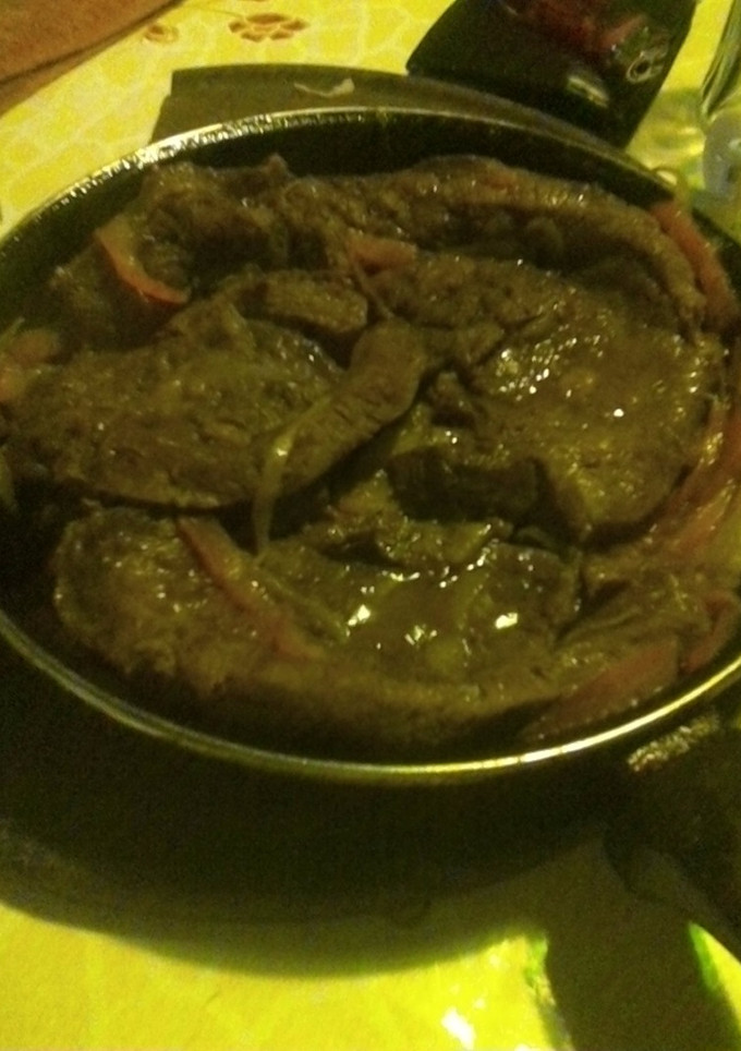 Una foto de Bife a la criolla