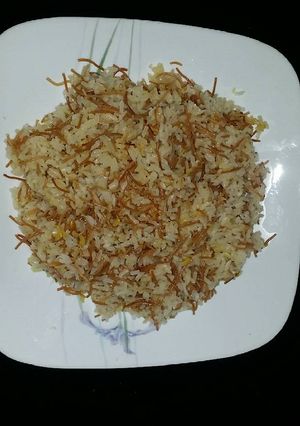 Una foto de Arroz con fideos