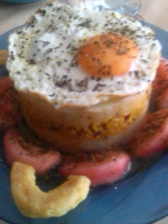 Una foto de Nido de patata con paella