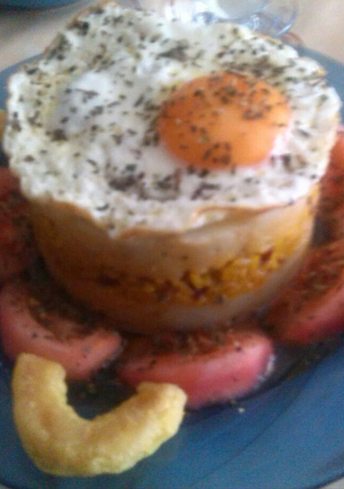 Una foto de Nido de patata con paella