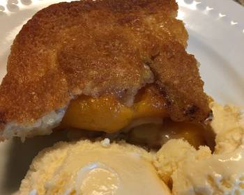 Best Recipe Peach Cobbler with BlueBell Homemade Vanilla Ice Cream Savory Delicious