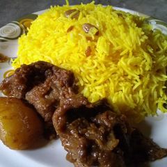 A picture of Mutton kosha with basanti pullav.