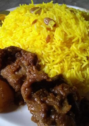 A picture of Mutton kosha with basanti pullav.