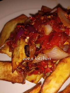 A picture of Fried sweet potatoes with sauce.