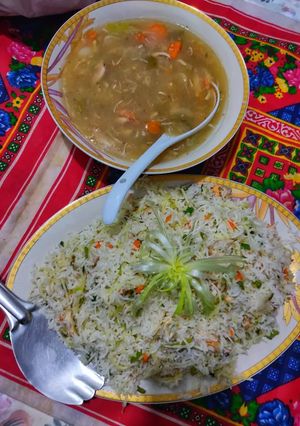 A picture of Chinese rice with chicken Chilli.