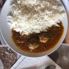 A picture of Kofte with white rice.