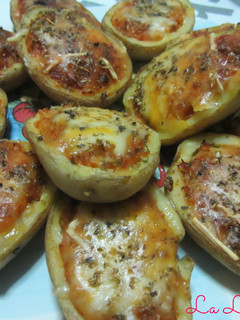 Una foto de Patatas rellenas sabor pizza