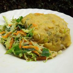 A picture of Green mashed bananas and sauteed vegetables.