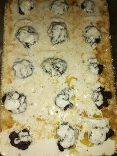 A picture of Kofta with Tahini and Onions.