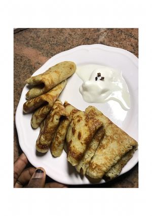 A picture of Crepés and ice cream.