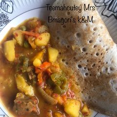 A picture of Sinasir with potato veggies.