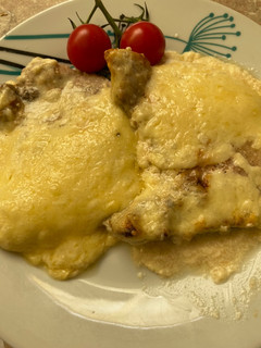 Una foto de Chuletas de cerdo gratinadas a los tres quesos