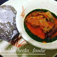 A picture of Ewedu and palmoil stew with amala.
