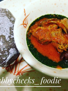 A picture of Ewedu and palmoil stew with amala.