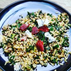 A picture of Brown rice & quinoa with spinach, blue cheese and salami.