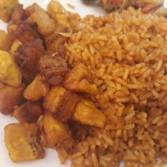 A picture of Jollof rice and dodo.